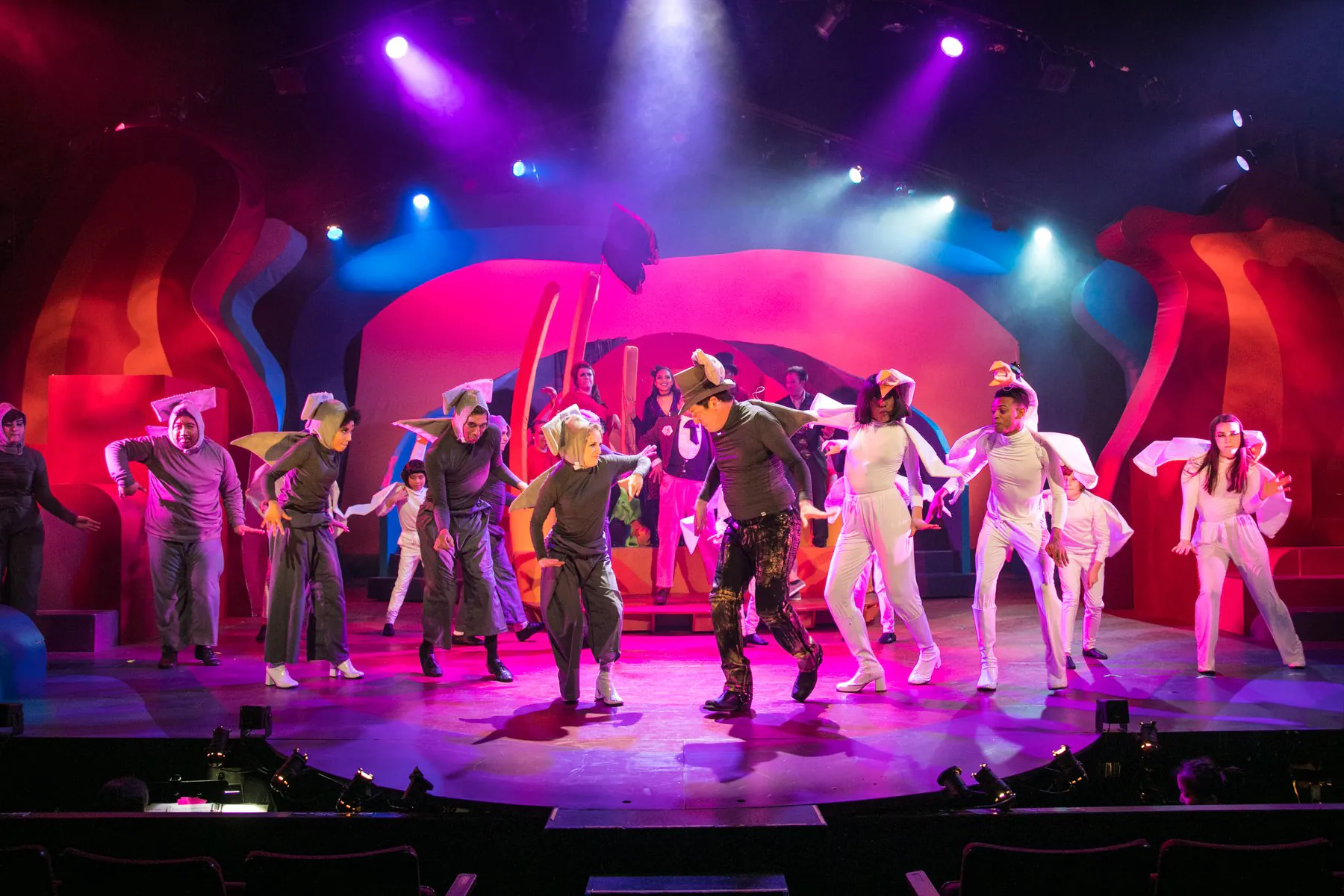 The bird ensemble dancing across the colorful James and the Giant Peach stage.