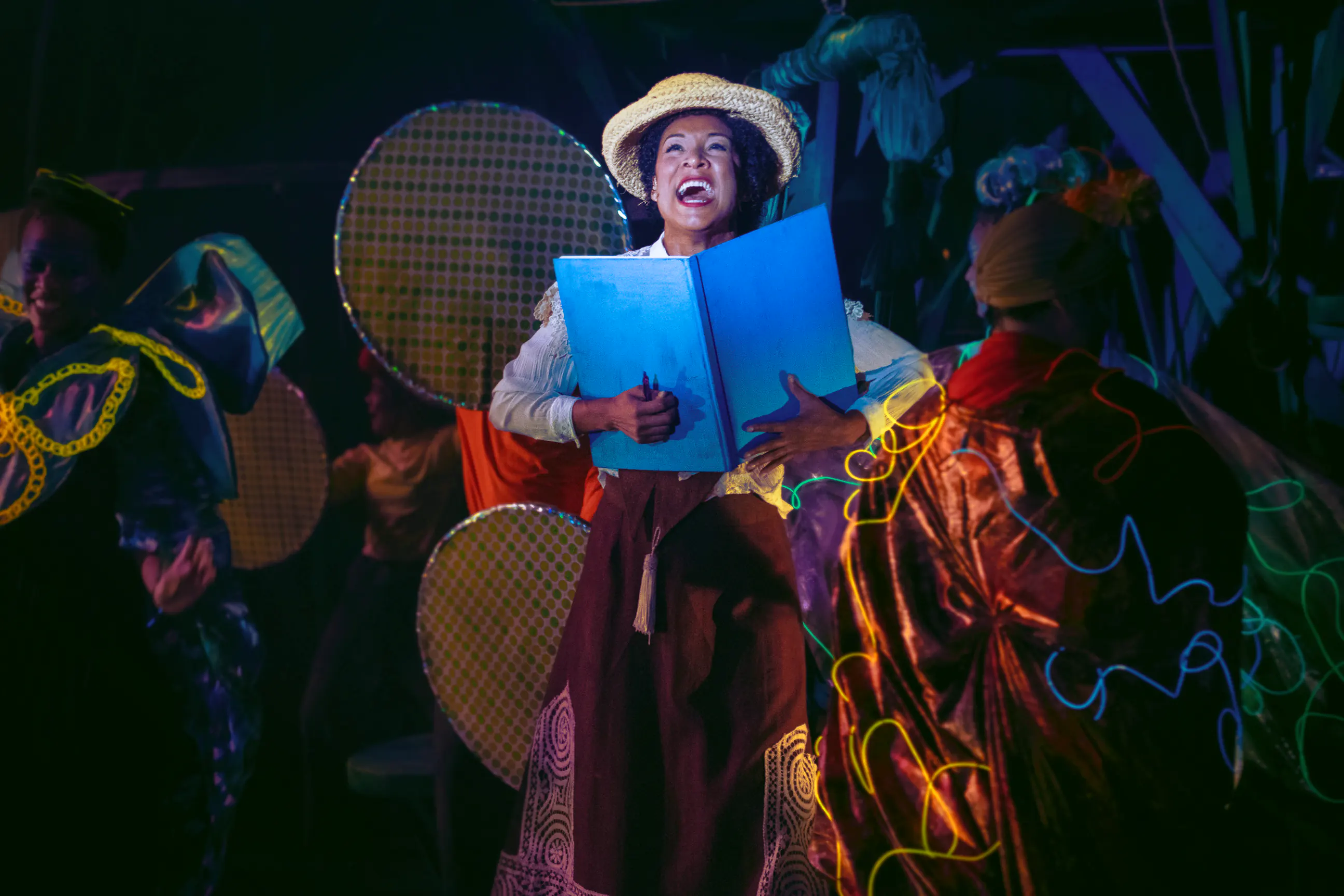 Jane presenting her field notes amid the jungle ensemble.