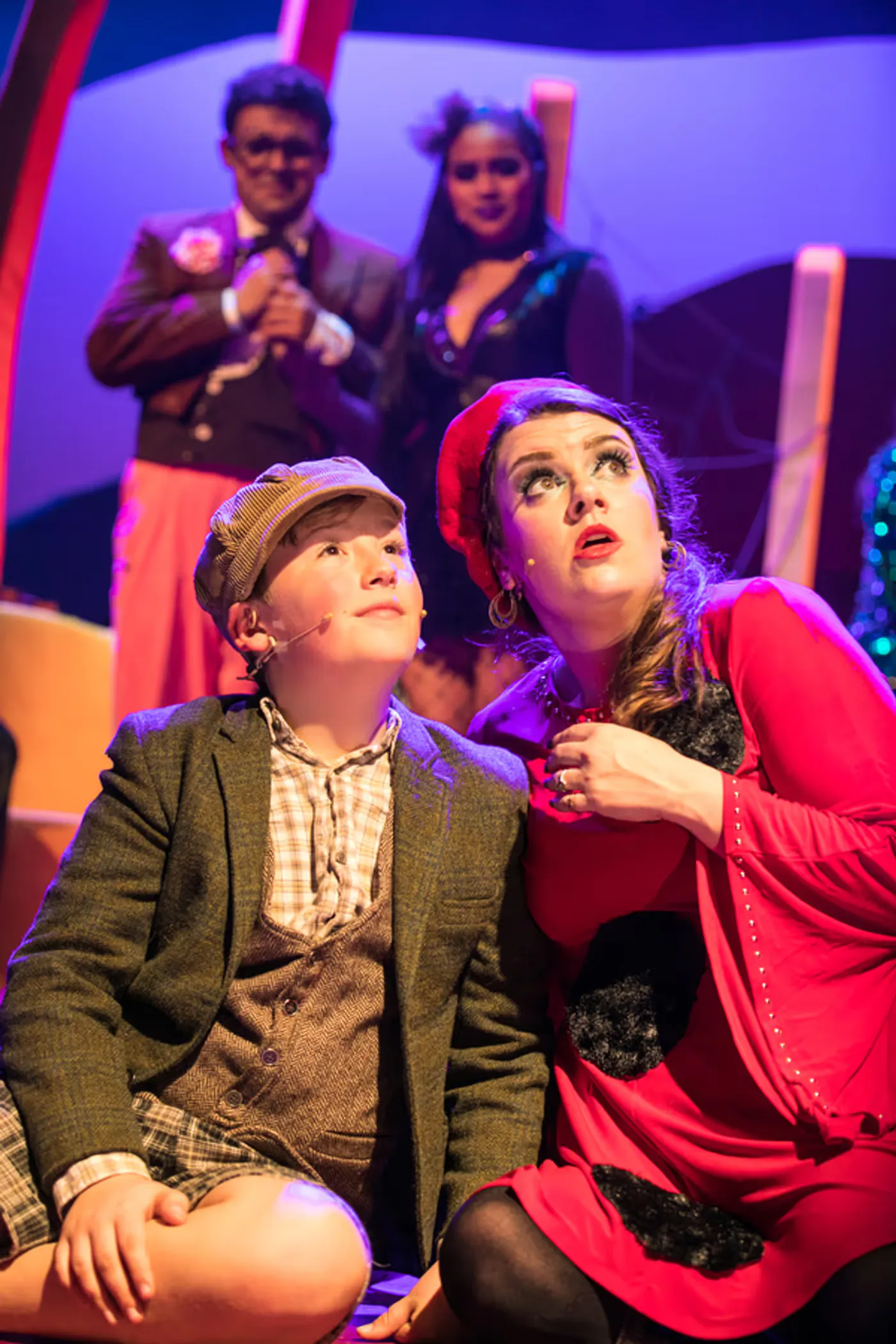 James and a companion looking upward during the musical.