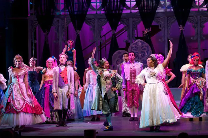 Frenchie Davis as the Fairy Godmother with the multicultural company at the ball.